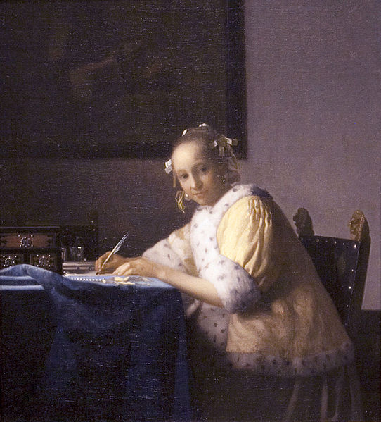 A lady writing.